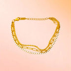 Bracelet on a color gradient of peach tones background.