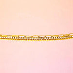 Bracelet zoom-in shot displayed on a light-toned background.