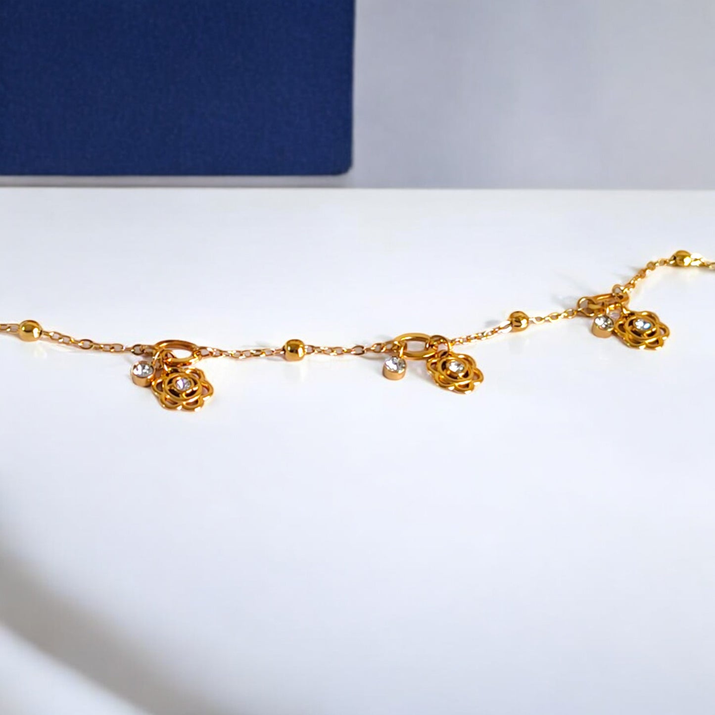 Gold Rose Charm Loose Bracelet with Crystals