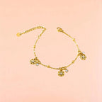 Bracelet on a color gradient of peach tones background.