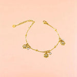 Bracelet on a color gradient of peach tones background.