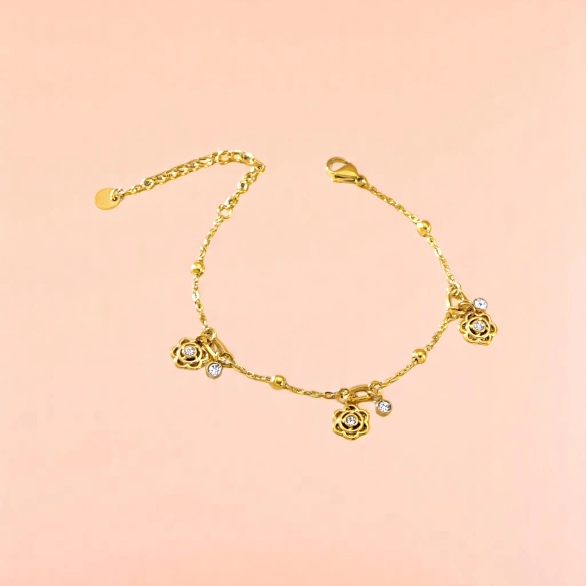 Bracelet on a color gradient of peach tones background.