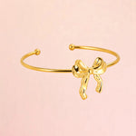 Bracelet on a color gradient of peach tones background.