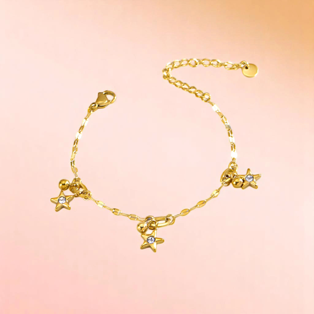 Bracelet on a color gradient of peach tones background.