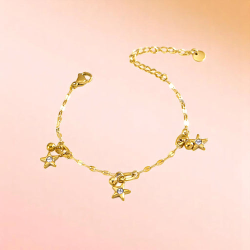 Bracelet on a color gradient of peach tones background.