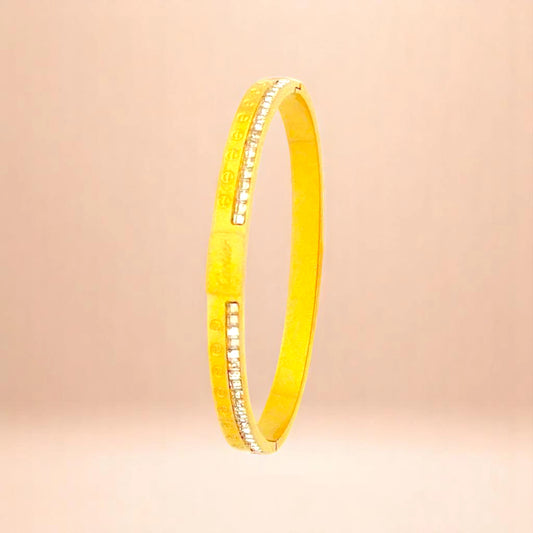 Bracelet on a color gradient of peach tones background.