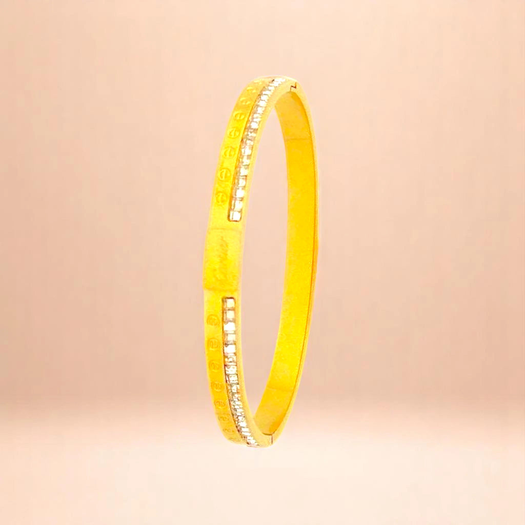 Bracelet on a color gradient of peach tones background.