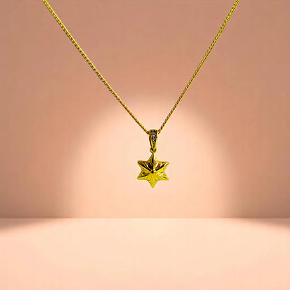 Necklace on a peach-toned gradient background.