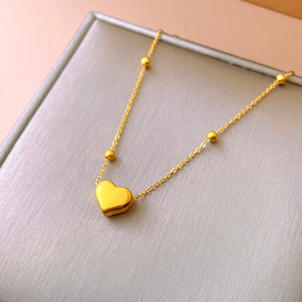 Bracelet on a soft fabric box with a light-toned background.