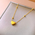 Bracelet on a soft fabric box with a light-toned background.