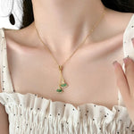 Necklace worn by a model.