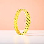 Bracelet set against a soft gradient background.