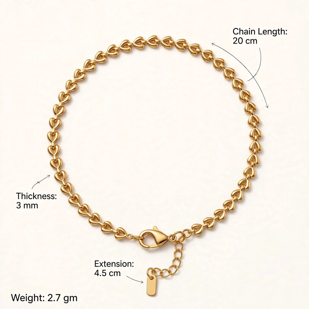Gold heart chain bracelet infographic with length, thickness, extension and weight labels.