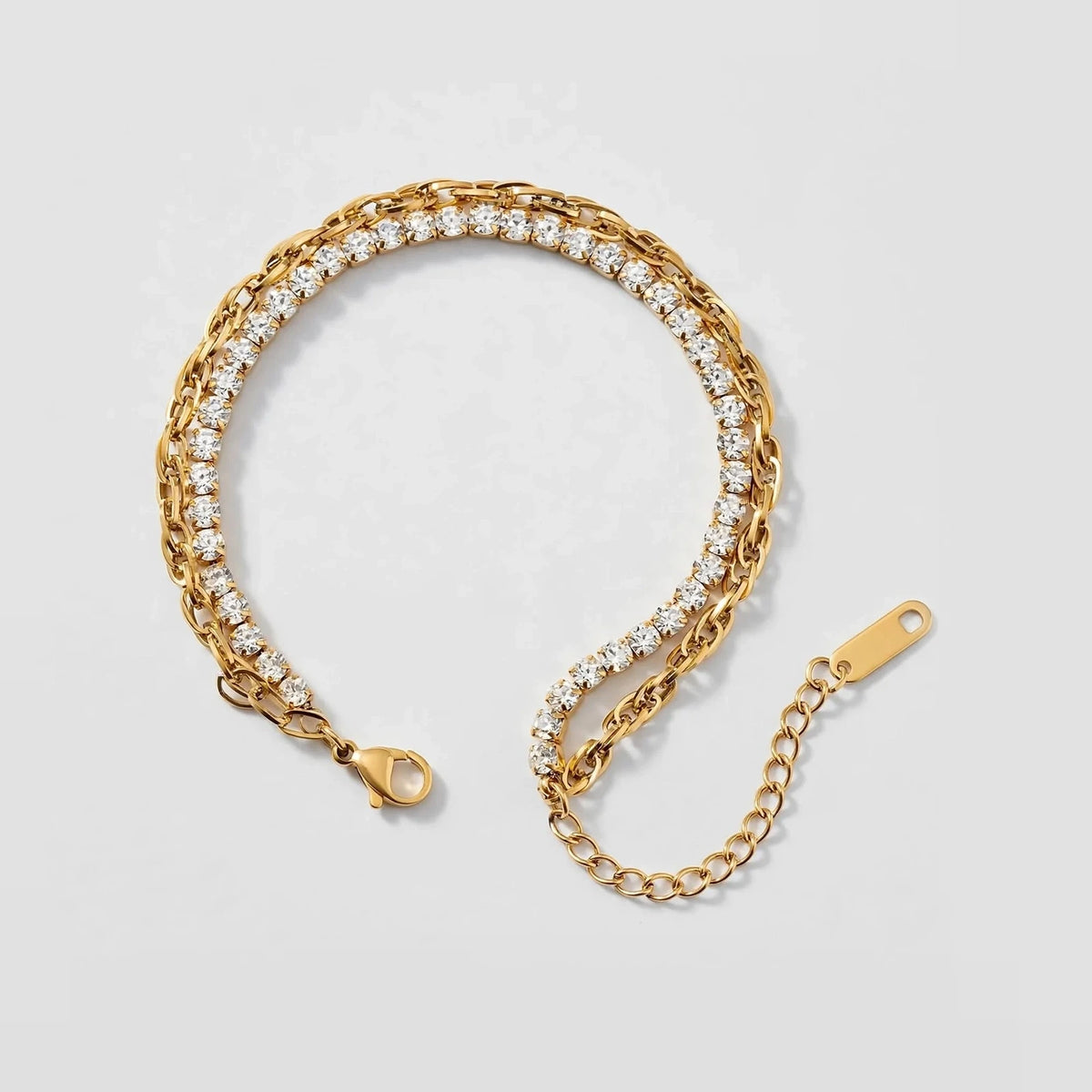 Double-layer gold bracelet with cubic zirconia and cable chain, open circle with small gap at bottom
