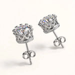Both silver crown diamond studs stones on top clasp down on invisible riser side view.