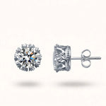 Silver crown diamond studs sideways view showing front and side profile on off-white.