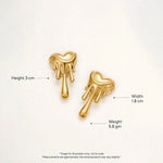 Gold melting heart drip earrings dimensions guide showing height width weight on warm-white background.
