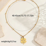 Gold clover necklace dimensions guide with chain length, extension, pendant size and weight labels