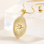 Side profile of gold sunburst pendant on invisible riser showing thickness and depth