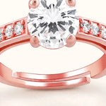 Extreme macro of rose gold solitaire ring showing centre stone and open band ends