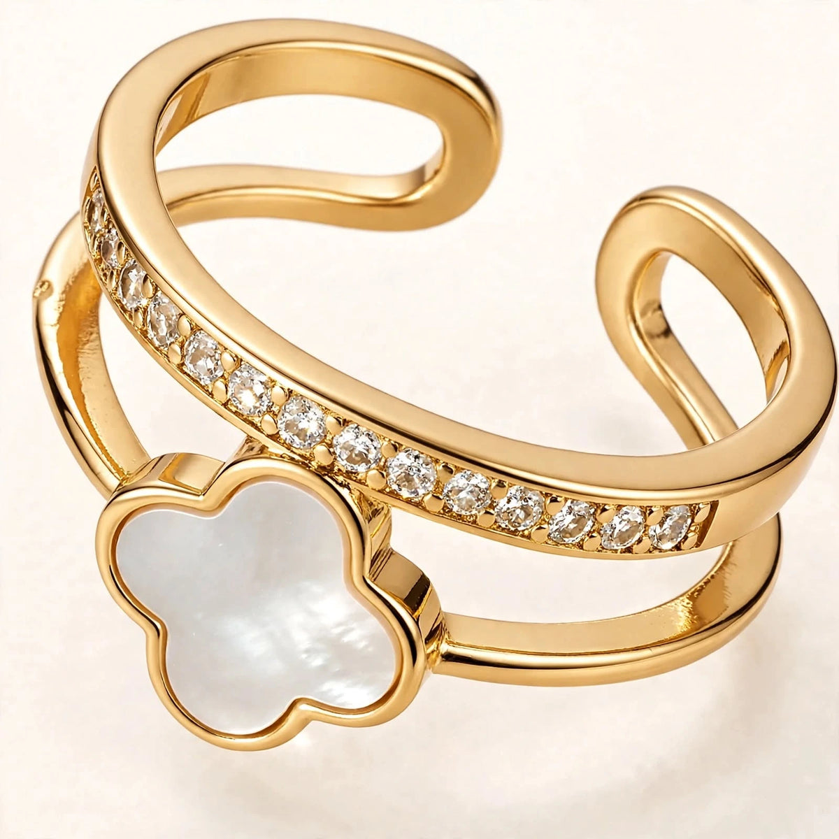 Extreme macro close-up of white clover gold ring showing crystal details
