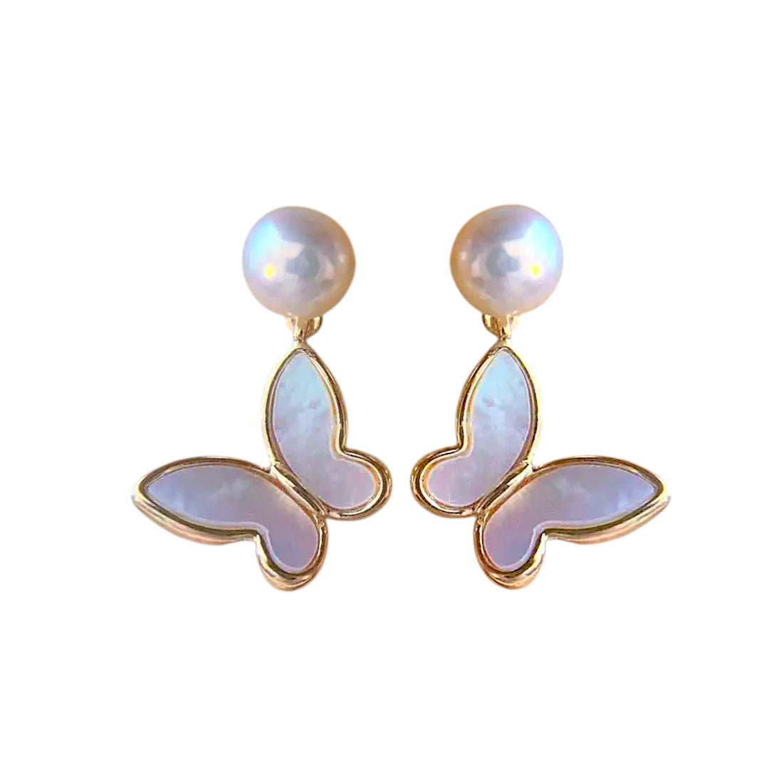 Pearl Butterfly Drop Earrings displayed on a White Background.