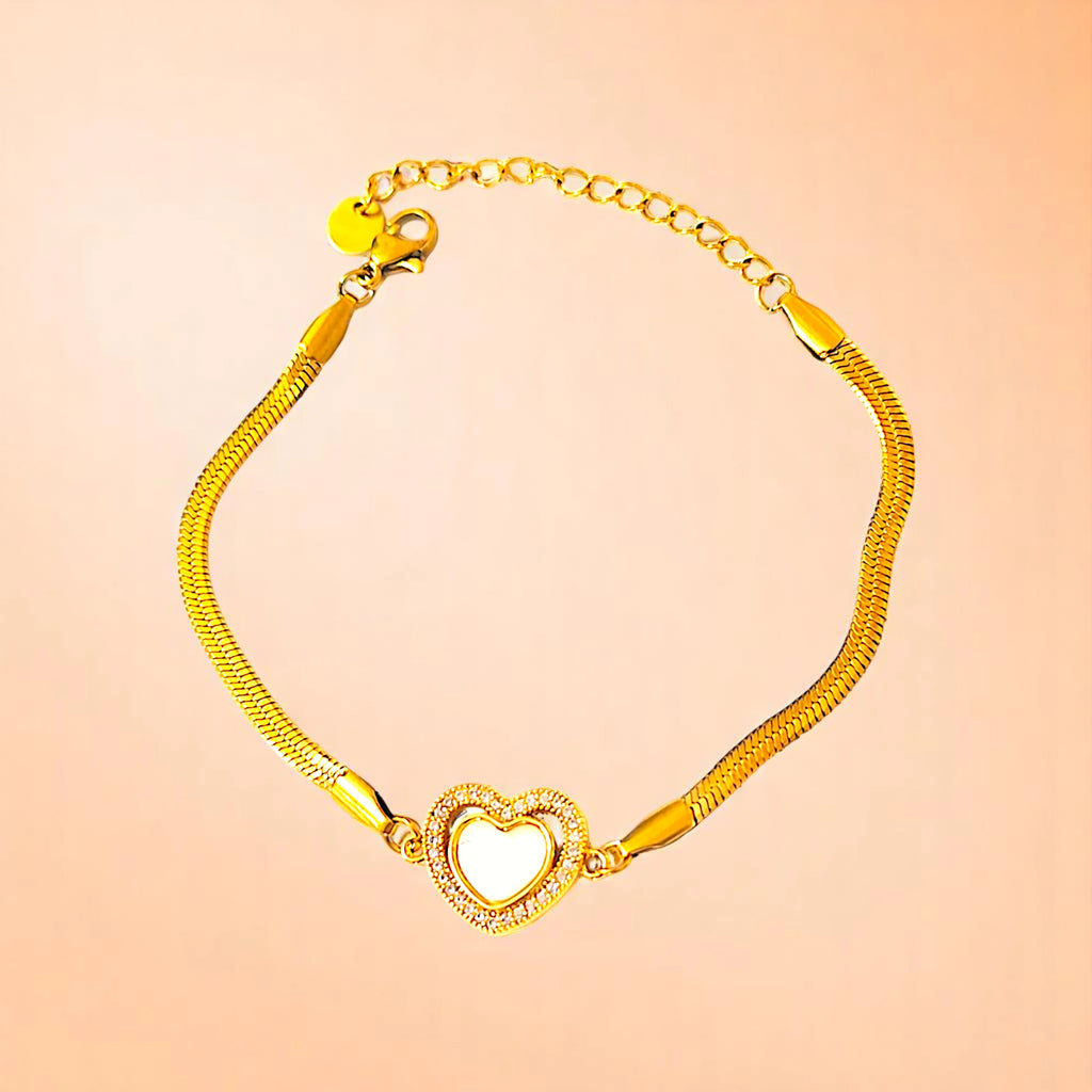 Bracelet on a color gradient of peach tones background.