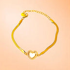 Bracelet on a color gradient of peach tones background.
