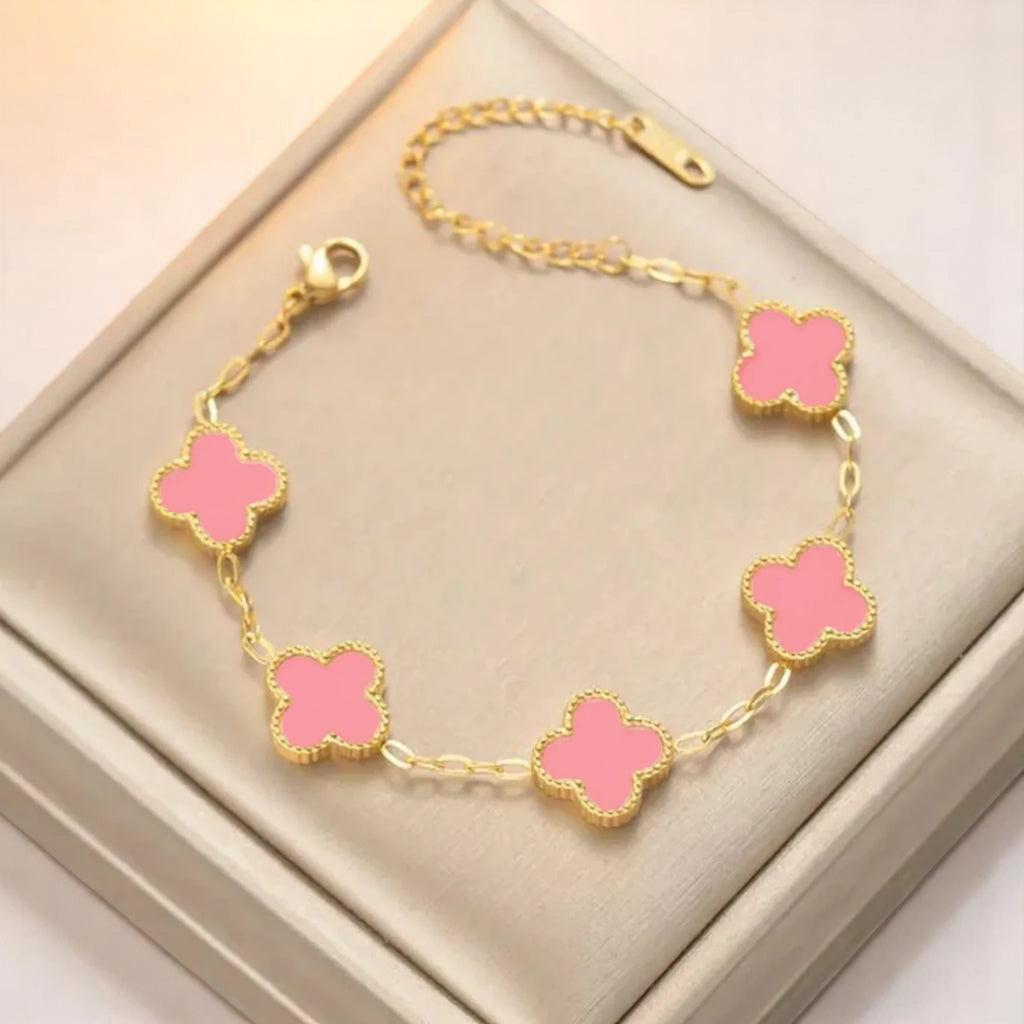 Bracelet on a soft fabric box with a light-toned background.