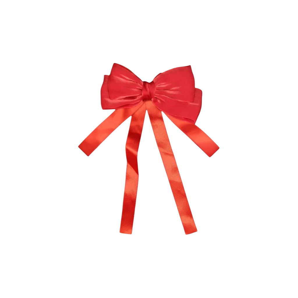 Red satin bow on a white background