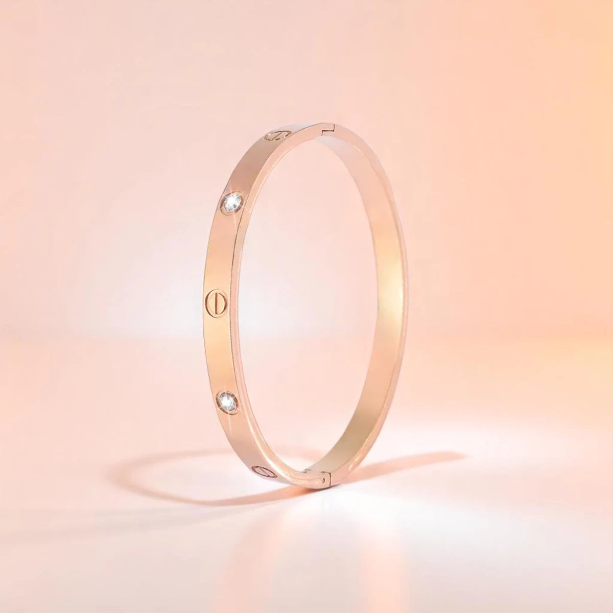 Bracelet set against a soft gradient background.