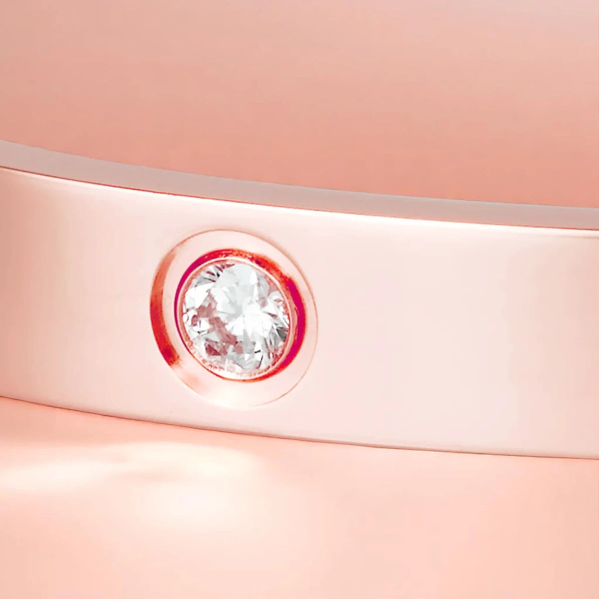 Bracelet close-up set against a soft gradient background.