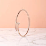 Bracelet set against a soft gradient background.
