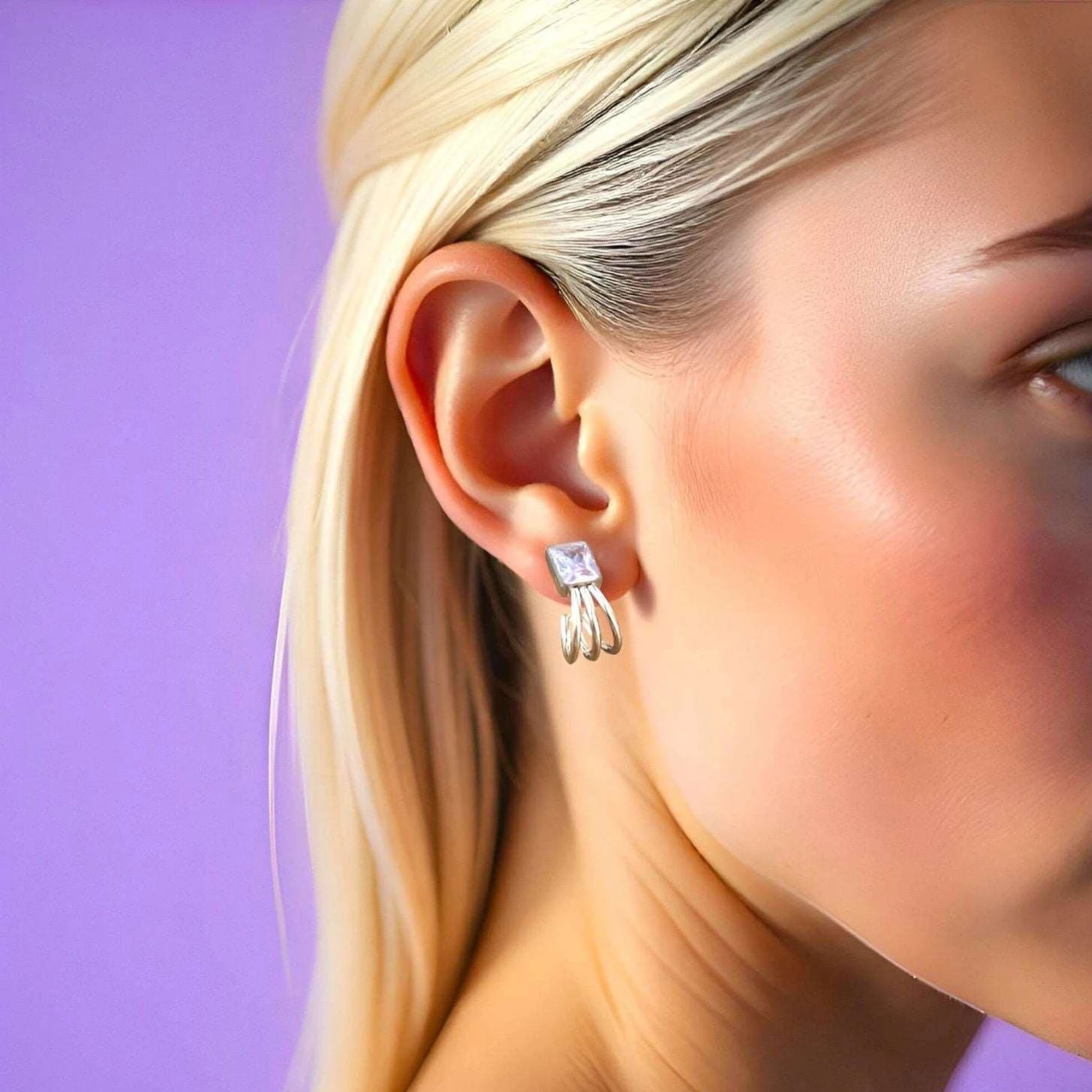 Rose Gold Cz Studs worn by a model.