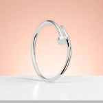 Bracelet set against a soft gradient background.