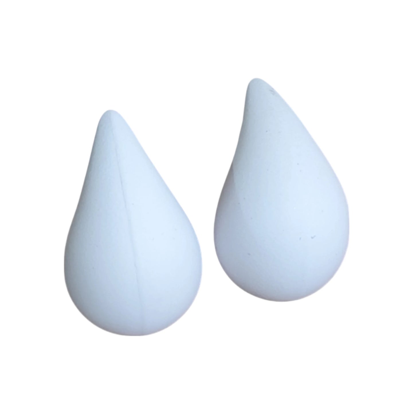 Snow White Teardrop Earrings displayed on a White Background.