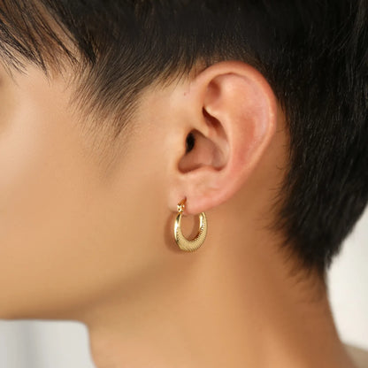 Textured Crescent Hoop Earrings worn by a model.
