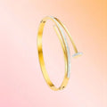 Bracelet on a color gradient of peach tones background.