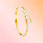 Bracelet on a color gradient of peach tones background.