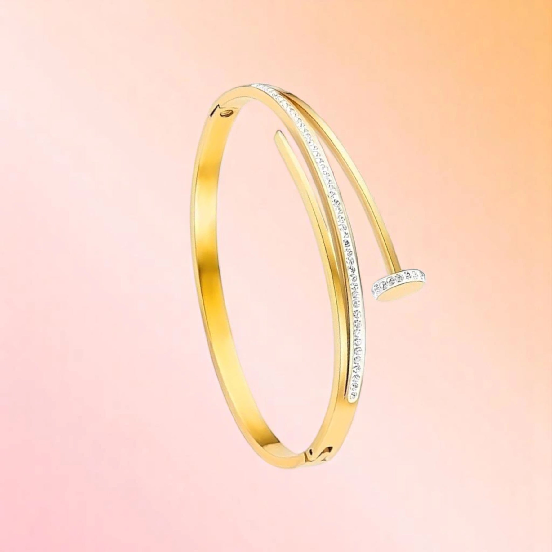 Bracelet on a color gradient of peach tones background.