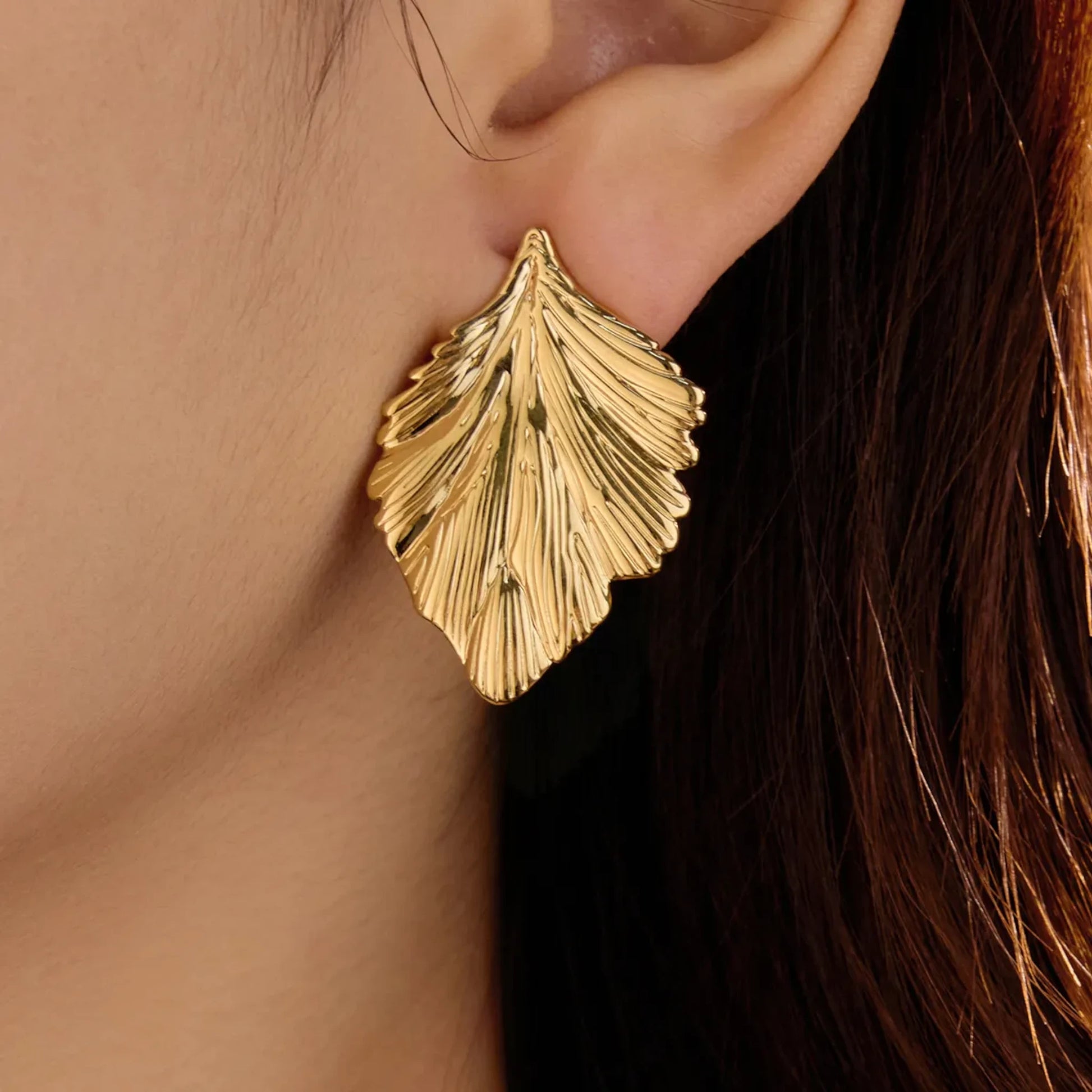 Vintage Leaf Stud Earrings worn by a model.