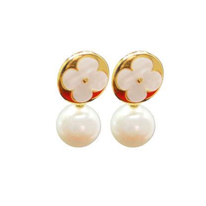 White Clover Pearl Drop Earrings displayed on a White Background.