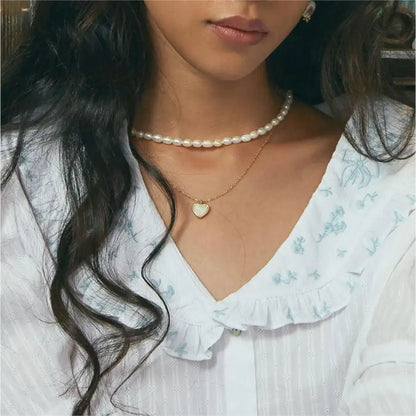 Necklace worn by a model.