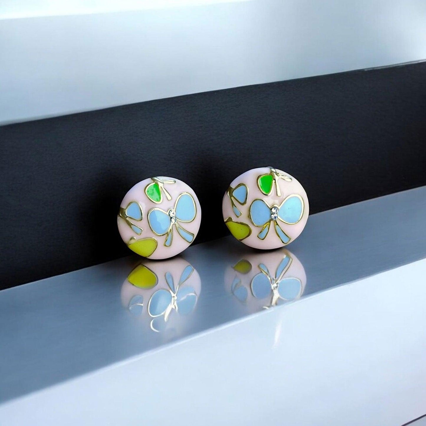 Floral Pink Stud Earrings with Blue Butterfly Motifs - JESPARA