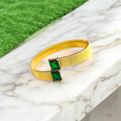 Gold Cuff Bracelet with Dual Emerald - Cut Green Stones - JESPARA