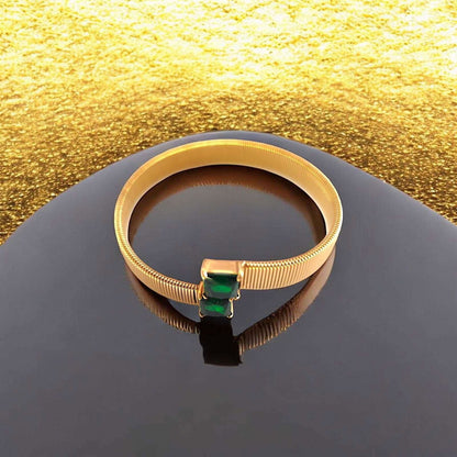 Gold Cuff Bracelet with Dual Emerald - Cut Green Stones - JESPARA