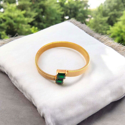 Gold Cuff Bracelet with Dual Emerald - Cut Green Stones - JESPARA