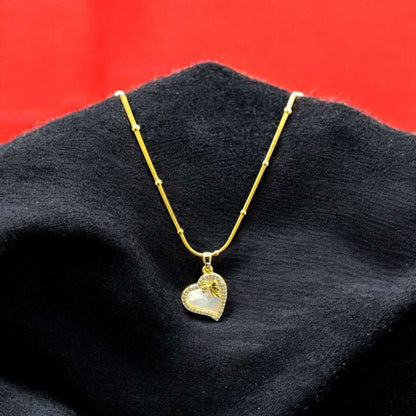 Gold Heart - Shaped Necklace with Pearl Inlay and Bow - JESPARA