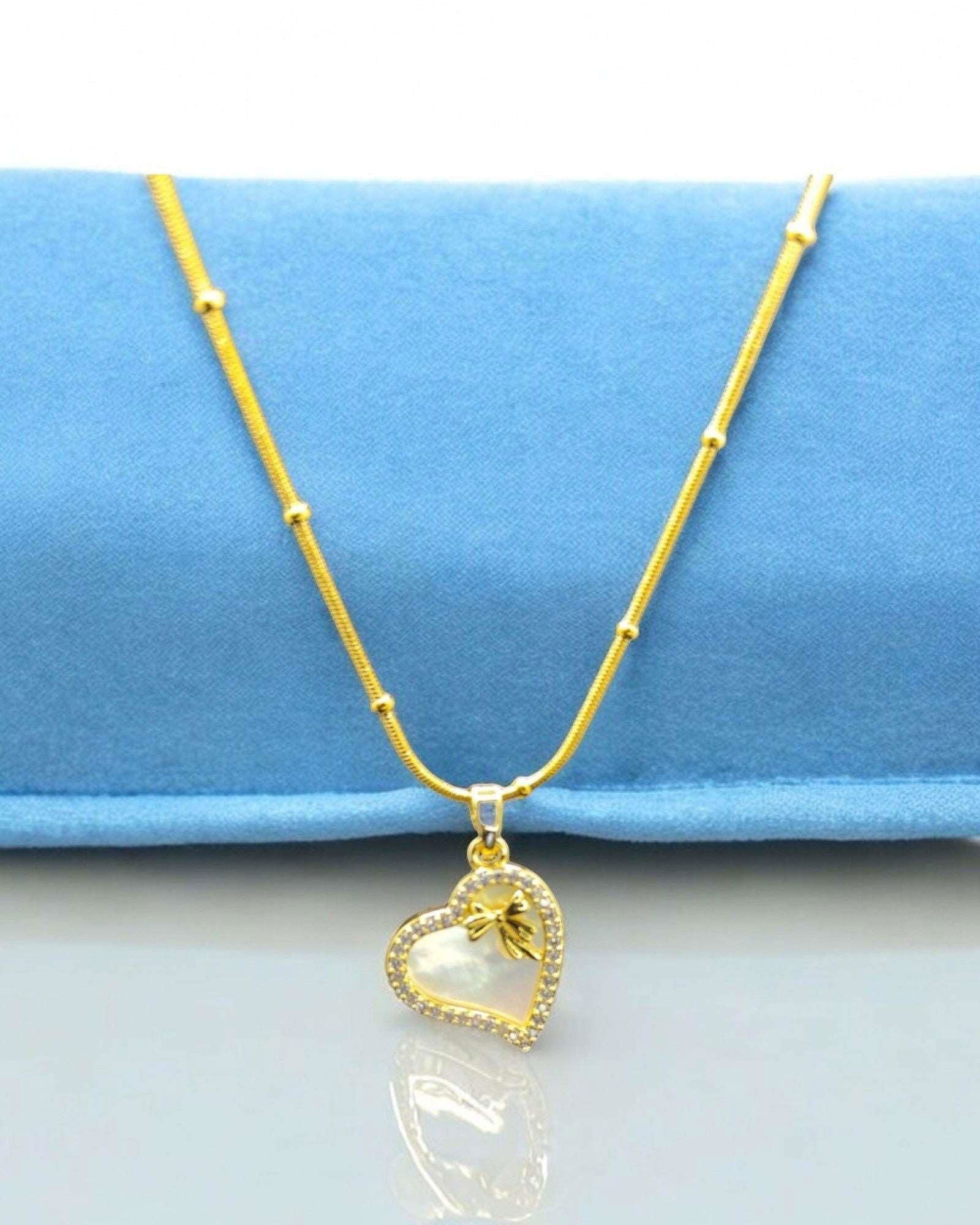 Gold Heart - Shaped Necklace with Pearl Inlay and Bow - JESPARA