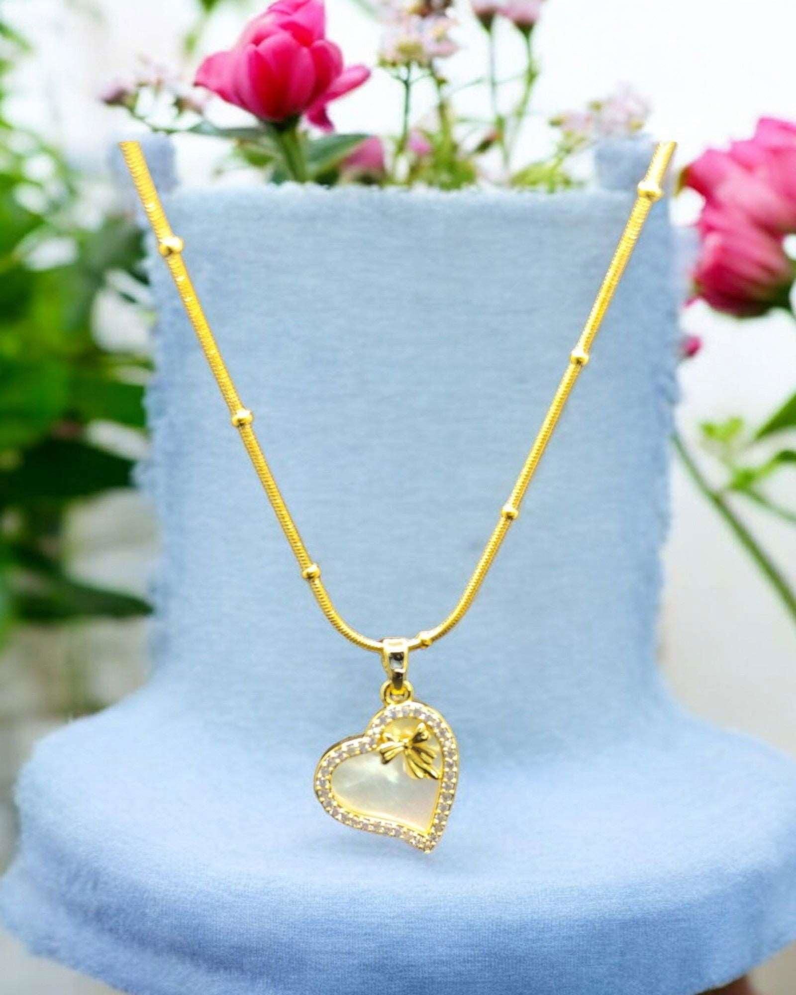 Gold Heart - Shaped Necklace with Pearl Inlay and Bow - JESPARA